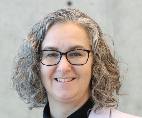 Smiling woman wearing eyeglasses